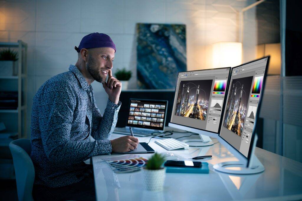 Graphic designer working on photo editing software